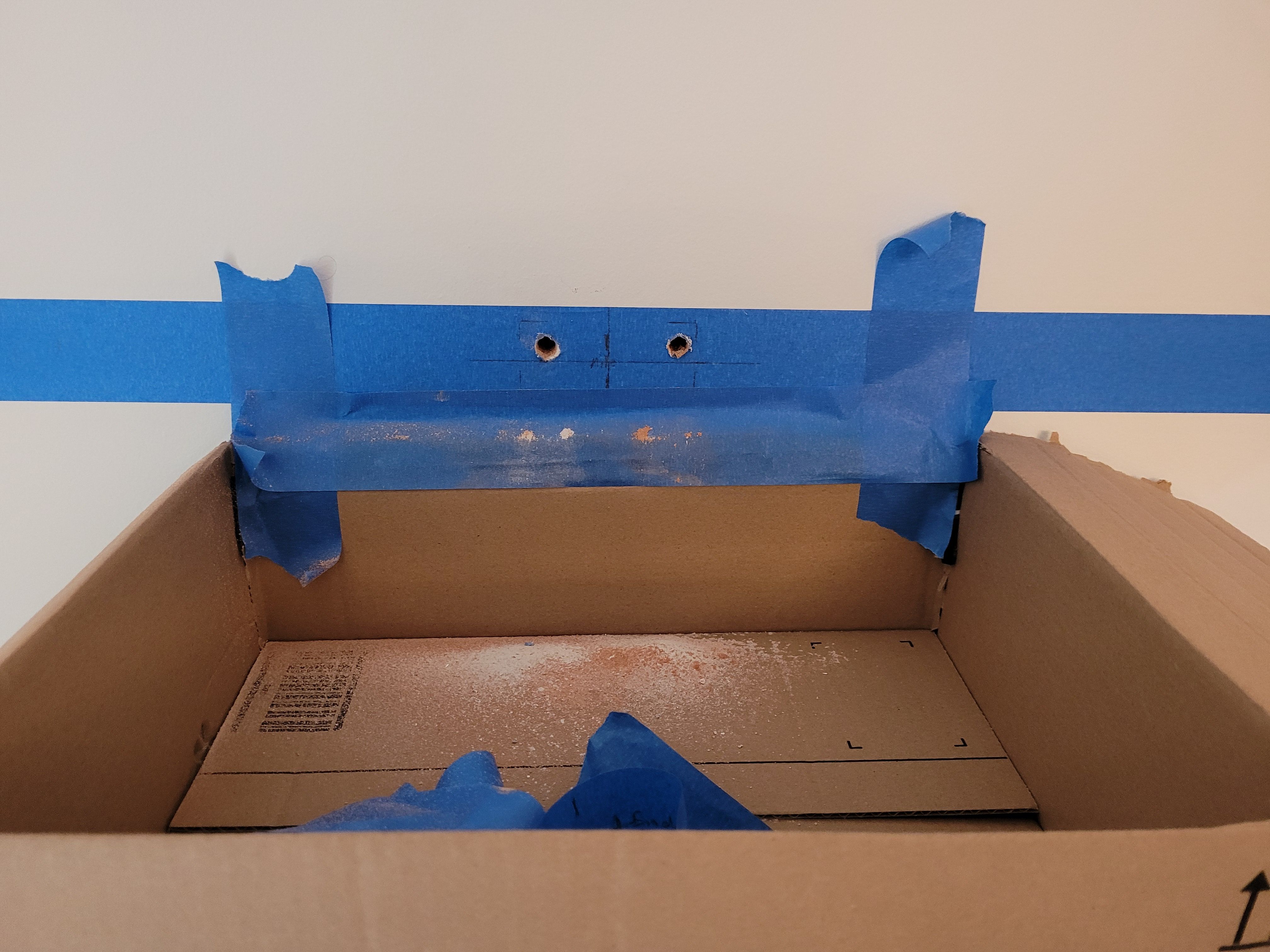 Drill holes through tape