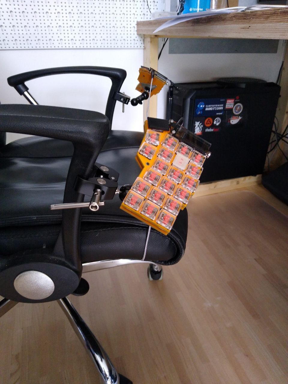Corne clamped to seat arm rests